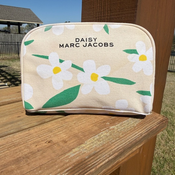 Marc Jacobs Handbags - NWOT Marc Jacobs Beige Floral Daisy Pouch Cosmetic Travel Bag